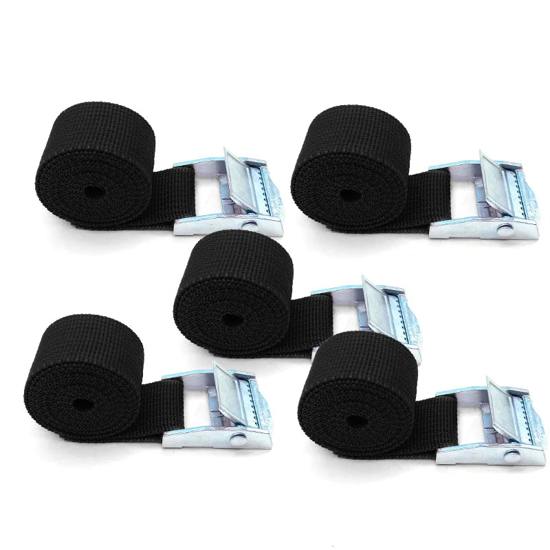 Five black cam buckle cargo straps with zinc-plated metal buckles, rolled on a white background