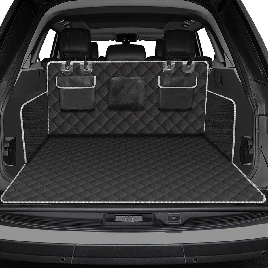 Waterproof Dog Car Boot Liner fitted in an empty SUV cargo area with side pockets and headrest straps