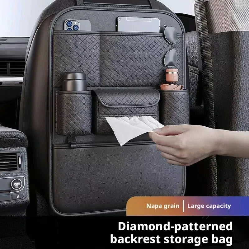 Multi-Pocket Car Backseat Organiser in use with a hand pulling a tissue from the built-in tissue pocket