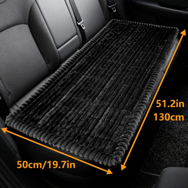 Black Plush Car Dog Bed shown fitted to a car back seat with dimensions 130cm by 50cm labelled