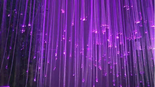 Collage of fiber optic curtain lights in blue, purple, gold, and white.