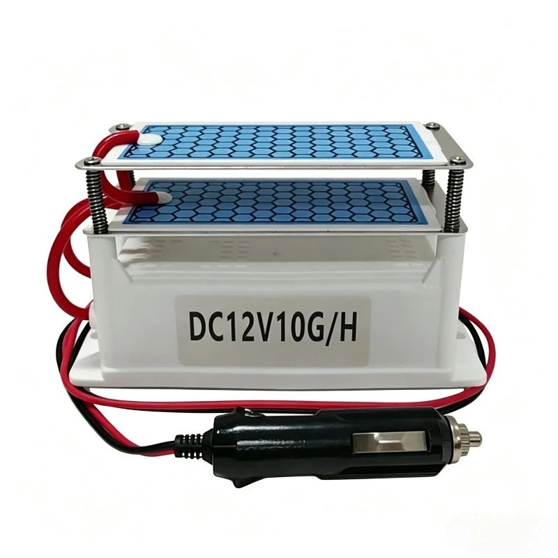 12V Vehicle Ozone Odour Eliminator with dual honeycomb ceramic ozone plates and cigarette lighter plug on white background