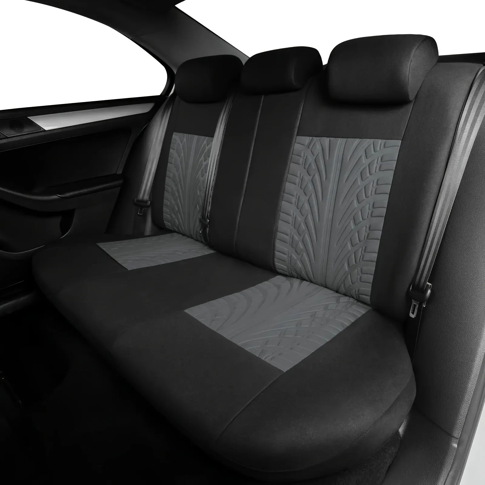 Black and grey universal car seat cover installed on the rear bench seat of a car.