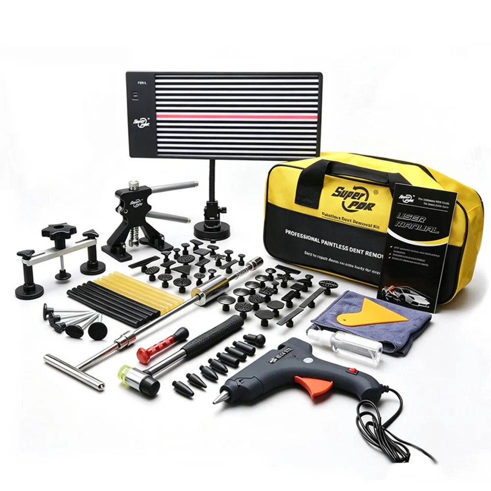 Paintless Dent Repair Kit with LED dent line board, glue gun, puller tabs, slide hammer, tools and yellow carry bag on a white background