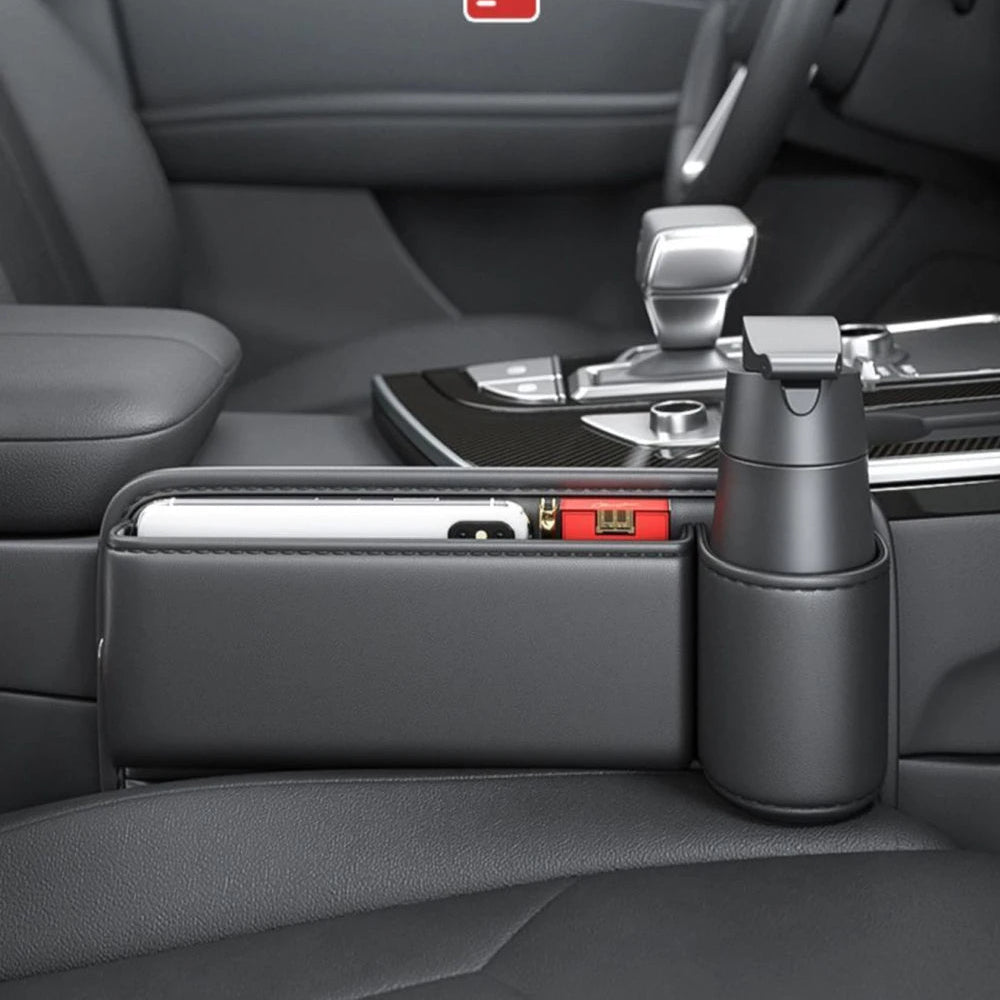 Leather seat gap organiser installed in a dark car console shown alongside a tablet or phone holder accessory.