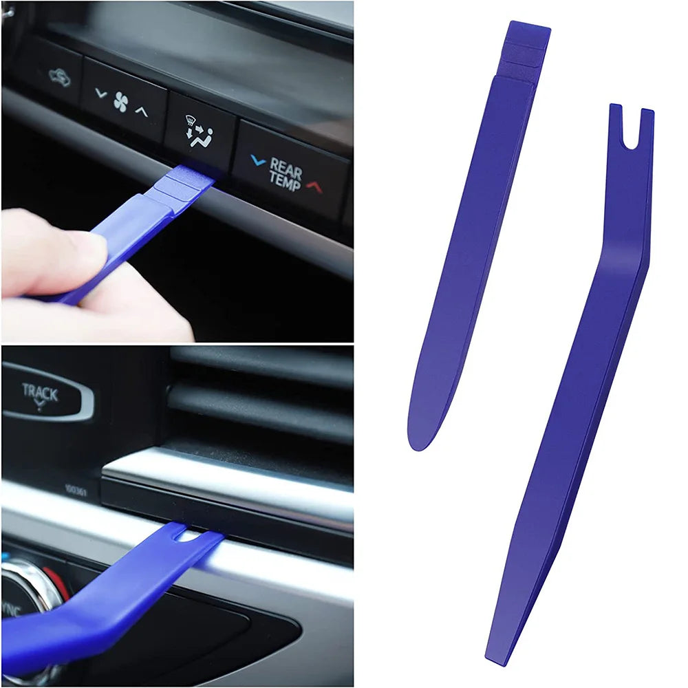 Door card pry bar removing a rear climate control panel and an air vent trim piece from a car dashboard, shown beside two flat interior trim tools.