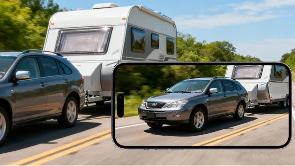 A gray SUV towing a white travel trailer on a road, with a smaller inset showing the same scene inside a phone-like frame. Large text at the top reads '1080p Vivid Image'.