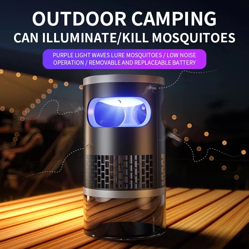 Rechargeable Suction Mosquito Trap glowing purple on a wooden outdoor table at night for camping