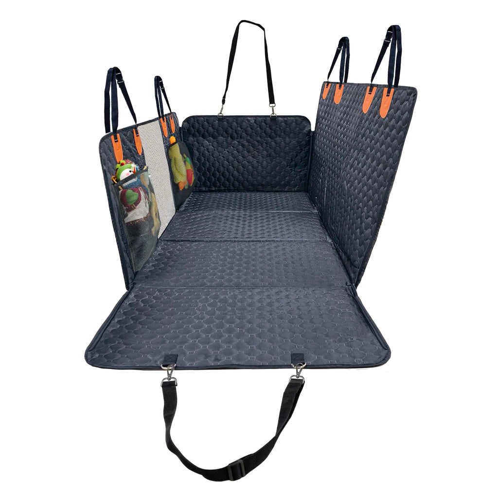 Washable Dog Seat Extender in grey honeycomb-quilted fabric with orange-tab headrest straps, side flaps and mesh pockets on a white background