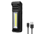 Rechargeable COB Work Light in stealth black with USB charging cable illuminated on a white background
