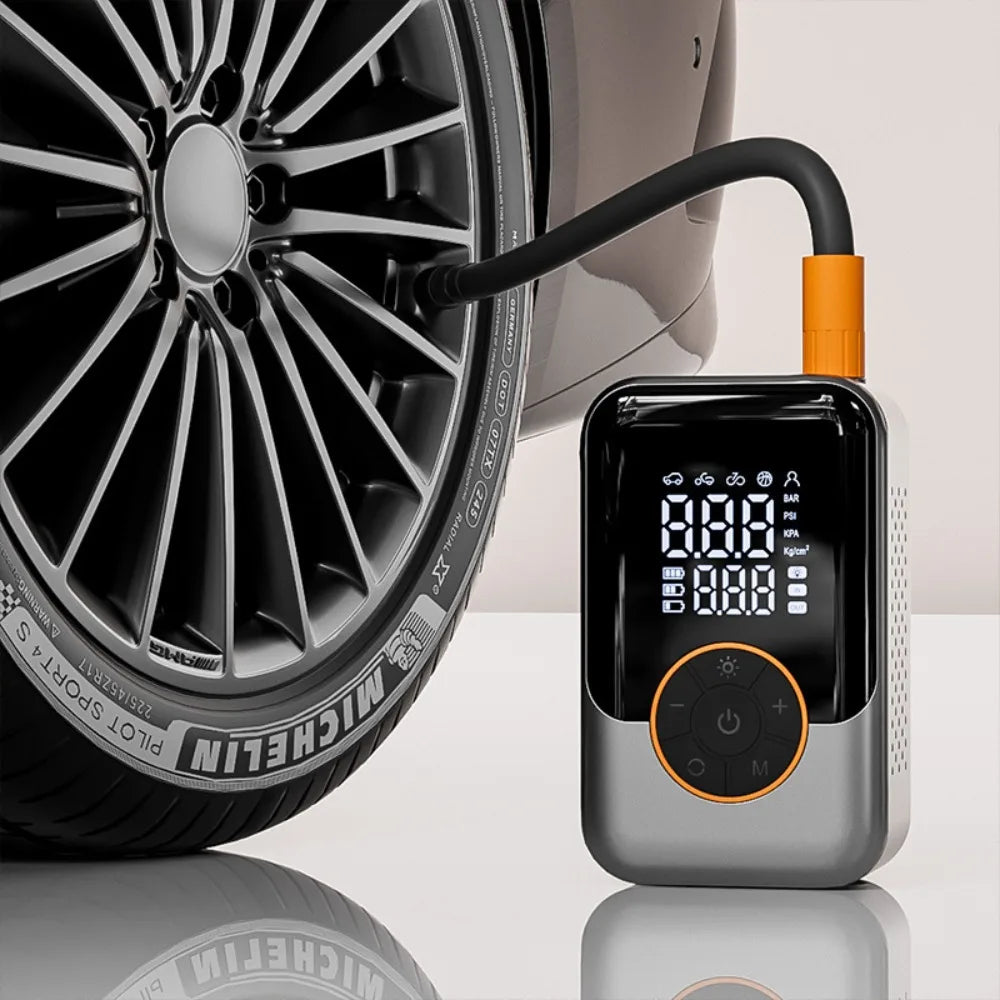 Compact Cordless Tyre Inflator connected to a car tyre valve with its digital pressure display visible