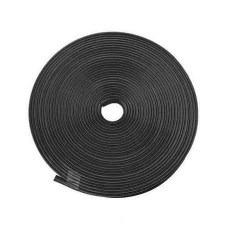 Coiled black rubber wheel rim protector strip roll photographed on a white background