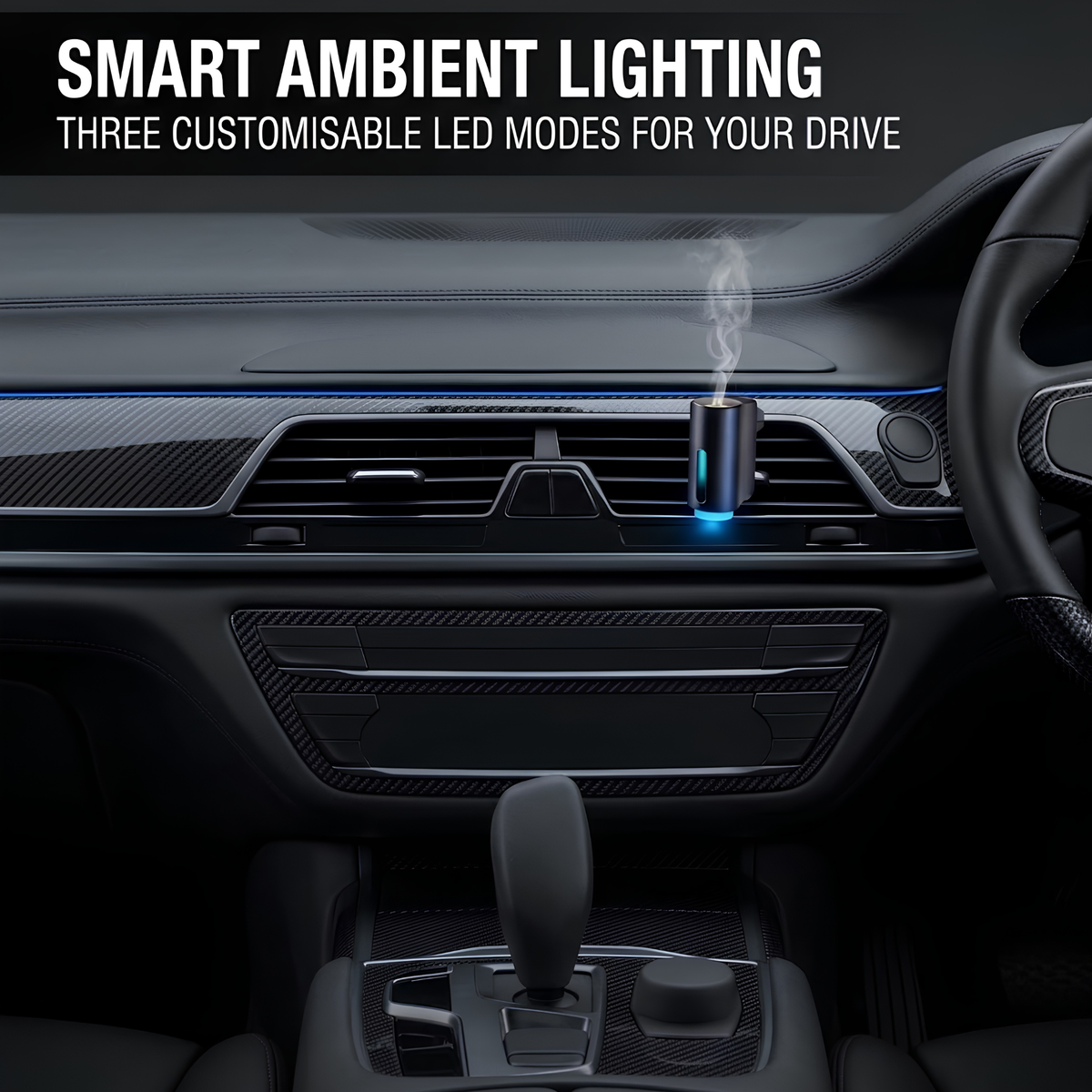 A small cylindrical ambient light diffuser or humidifier placed on a car air vent, emitting a visible plume of steam. The image is set inside a car interior with dashboard, steering wheel, and gear shift visible.
