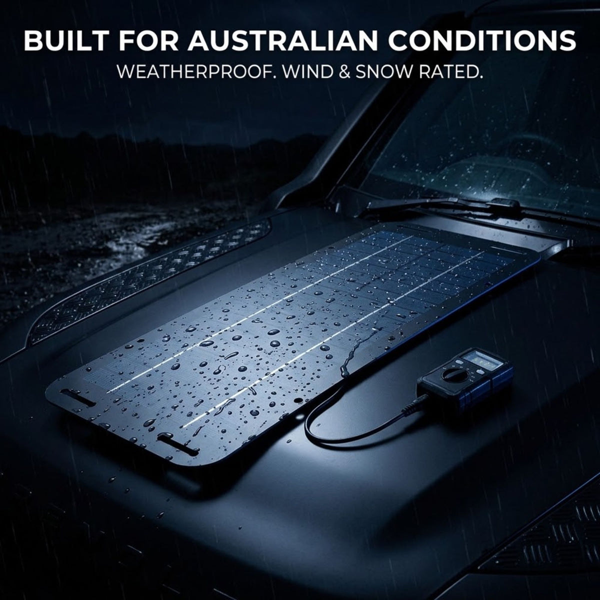 A car hood-mounted solar panel system with a small attached power unit, shown in rain on a dark vehicle. White text at the top reads 'BUILT FOR AUSTRALIAN CONDITIONS' and 'WEATHERPROOF.
