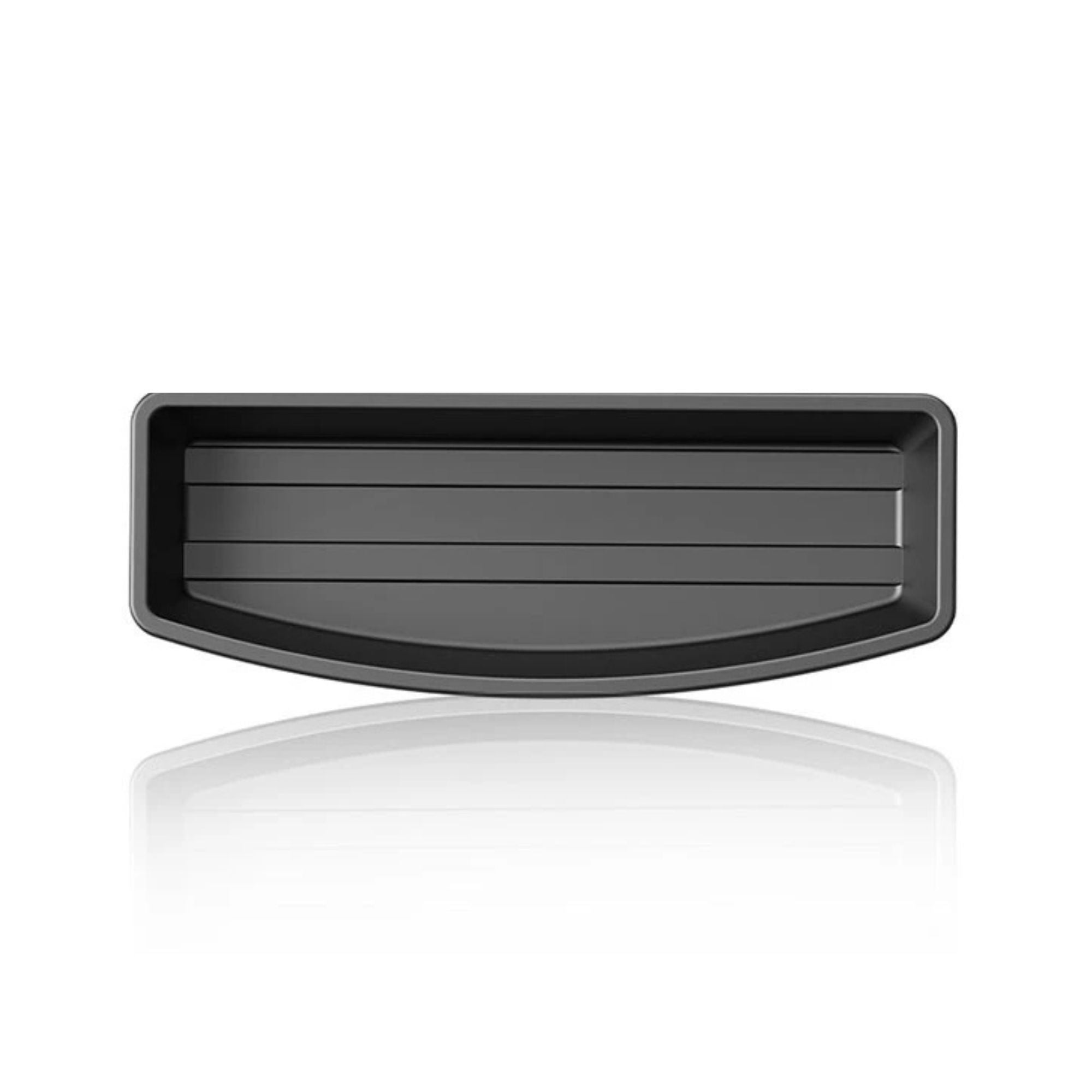 Top-down view of the empty black Under-Seat Storage Drawer with its reflection on a white background