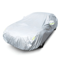 All-Weather Vehicle Cover fitted over a sedan with reflective safety strips