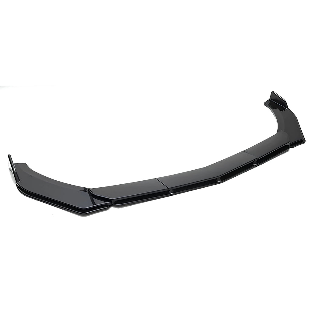 A glossy black automotive front bumper lip spoiler, photographed on a seamless white background.