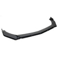 A glossy black automotive front bumper lip spoiler, photographed on a seamless white background.