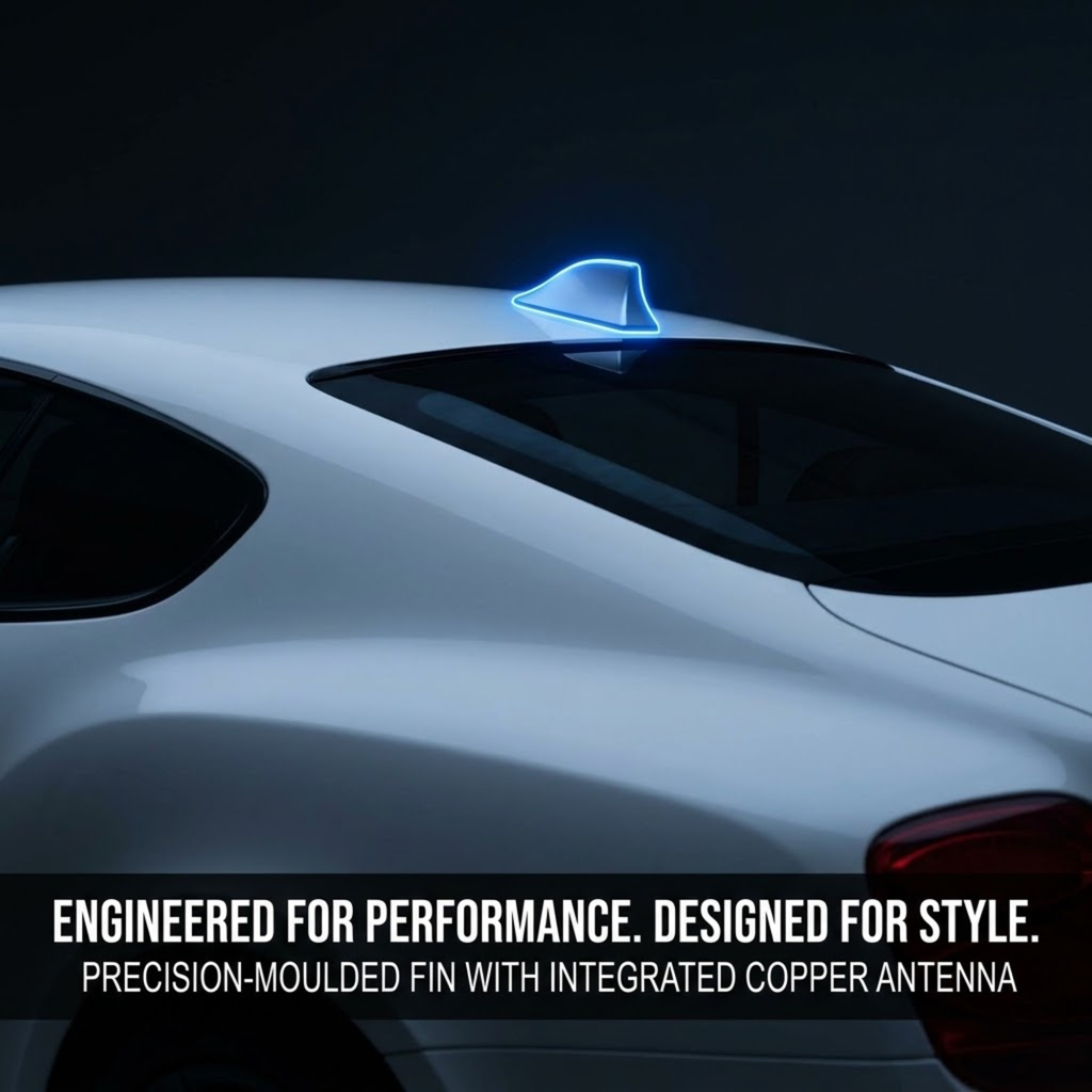 A close-up of the rear roof area of a white car with a glowing blue accent and an integrated copper-colored antenna on the roof. Text at the bottom reads: 'ENGINEERED FOR PERFORMANCE.
