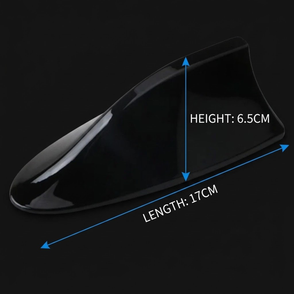 A glossy black shark fin antenna shown on a black background with blue dimension arrows and text indicating a height of 6.5CM and a length of 17CM.