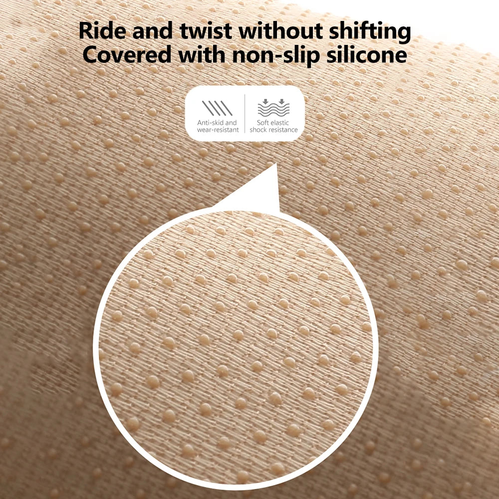 Close-up of the non-slip silicone dotted backing on a car seat cushion designed to prevent shifting during use.