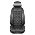 A single black quilted flannel heated car seat cover and winter protector cushion isolated on a pure white background.
