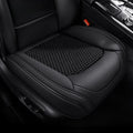 Black ice silk seat cover fitted to a car driver seat with a woven cooling mesh centre panel