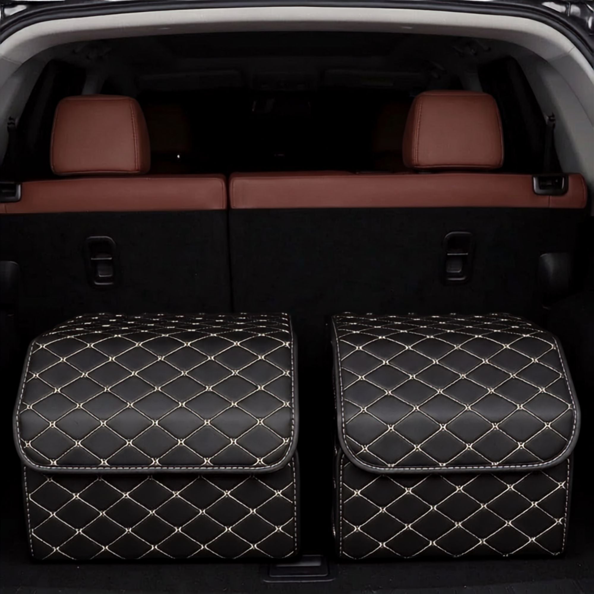 Two Heavy-Duty Leather Car Boot Organisers with gold stitching neatly placed in a car trunk