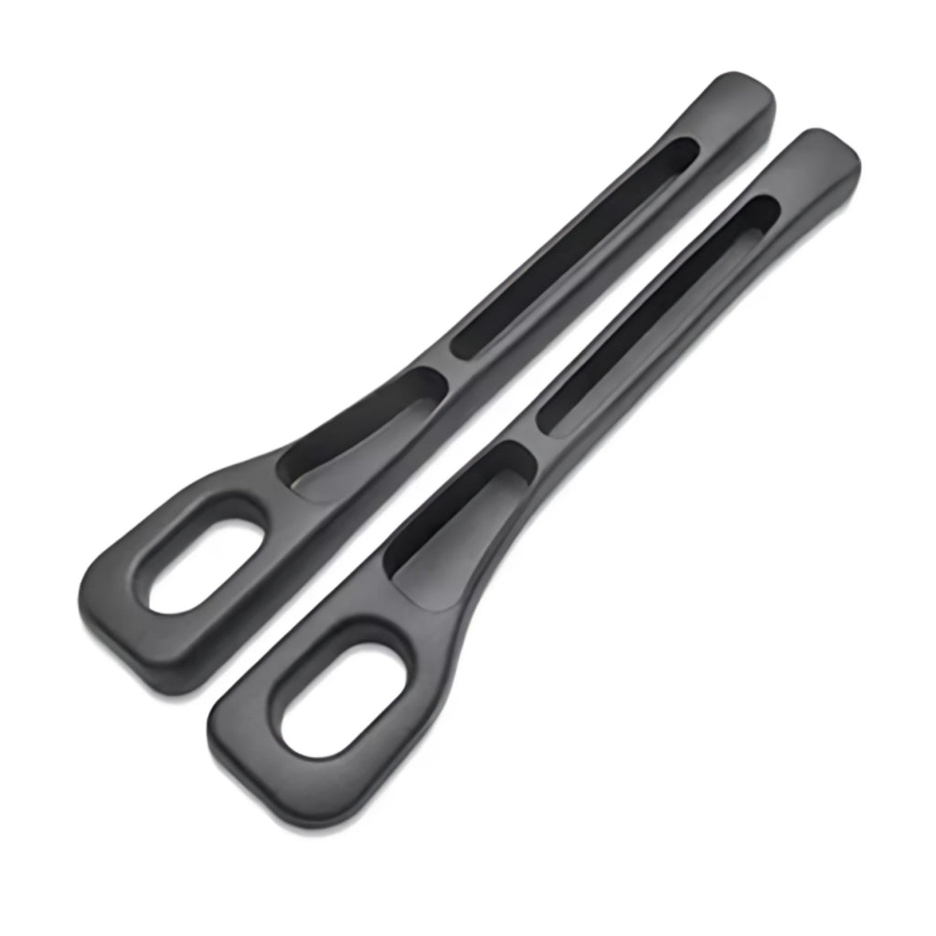 Two black car seat gap fillers and console crevice storage organisers isolated on a white background.