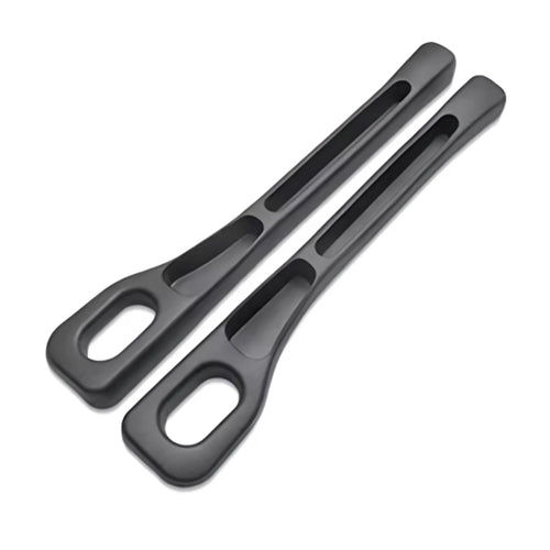 Two black car seat gap fillers and console crevice storage organisers isolated on a white background.