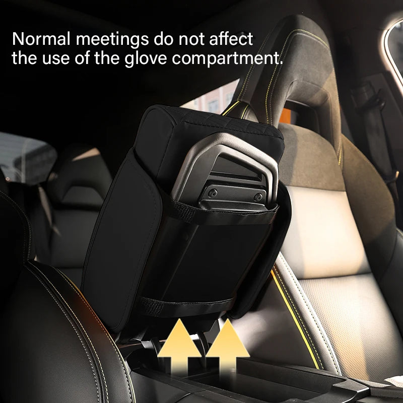 Vehicle centre console lid raised with the armrest cushion attached, demonstrating that it does not obstruct the factory glove compartment opening mechanism.