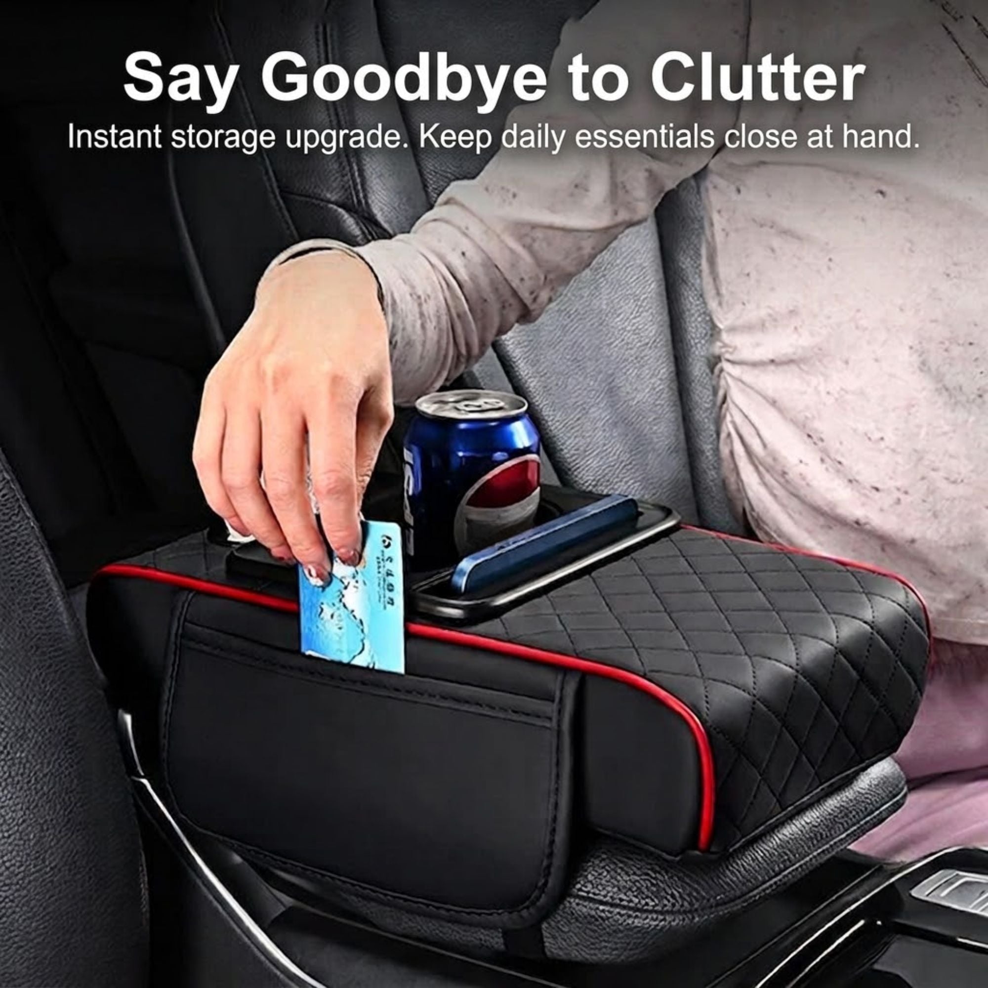Driver placing a card into the side storage pocket of the centre console armrest cushion to organise loose cabin items.