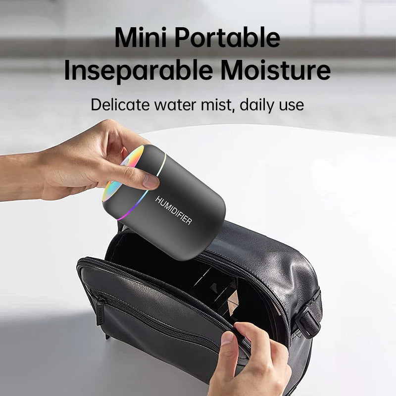 A hand placing the compact 180-millilitre car humidifier into a small travel bag, illustrating its lightweight and portable design.