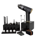 Black handheld hair styler set with multiple attachments, a charging cable, a stand, a floor nozzle, and a small orange-accented carrying case on a white background.