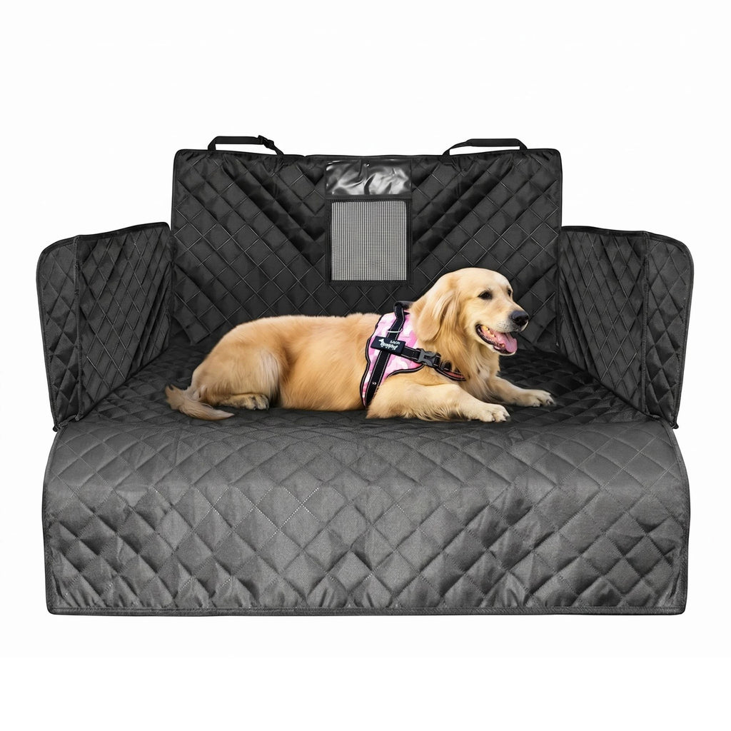 Quilted black dog car seat cover and interior boot liner installed in a vehicle cargo area with a golden retriever resting on it.