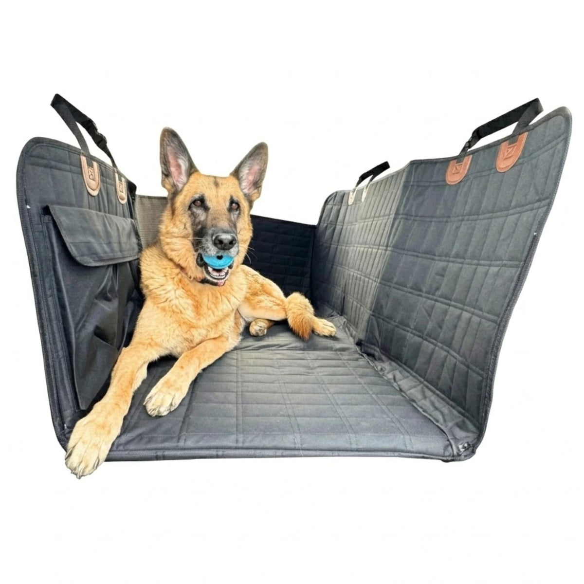 Hard-Base Dog Seat Extender in black, German Shepherd lying on the flat rear seat platform with side door protectors, on a white background