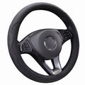 Black embossed PU leather steering wheel cover and interior protector featuring textured side panels, displayed on a steering wheel against a white background.