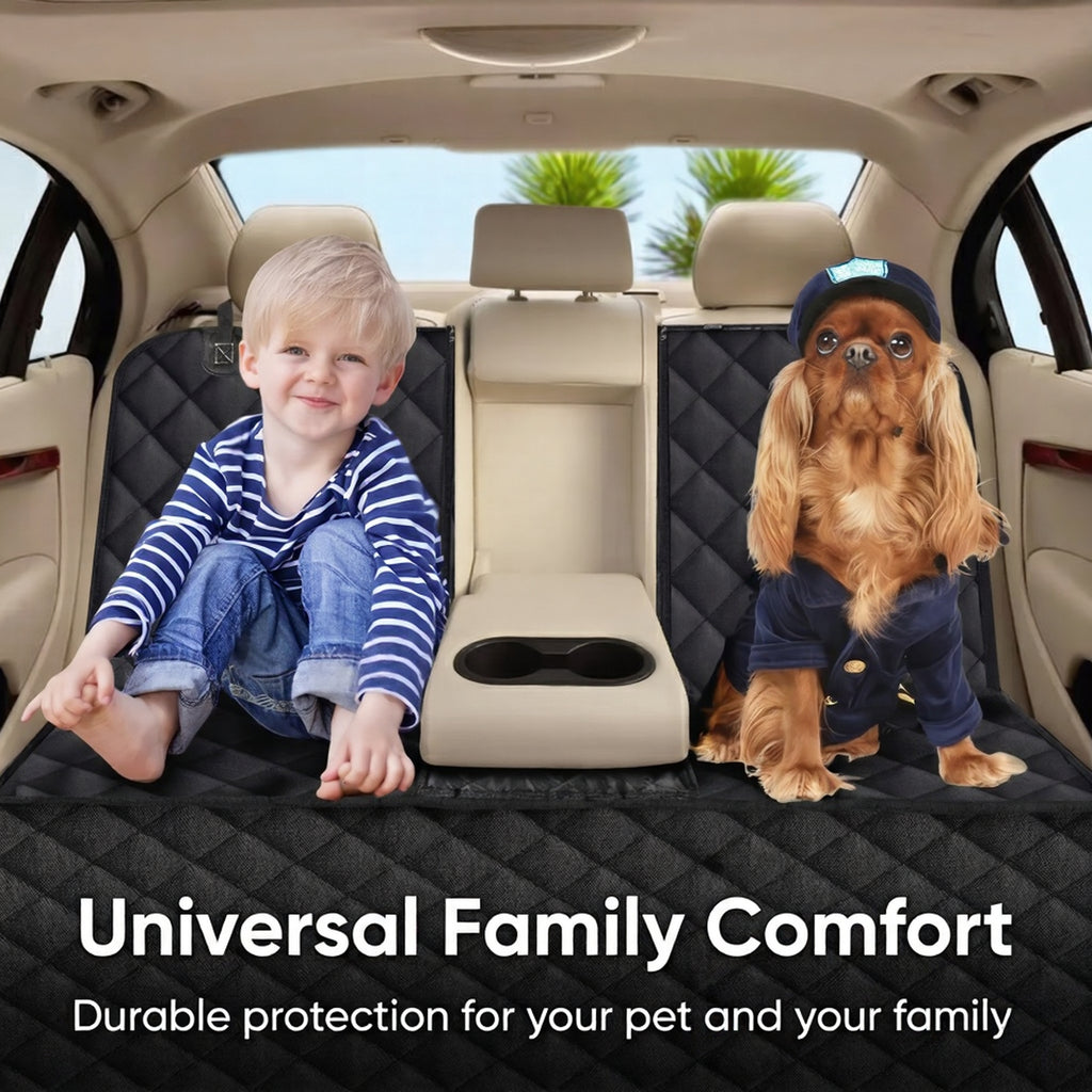 Young child and a small dog sitting safely together in the backseat of a car on a durable black quilted pet seat cover.