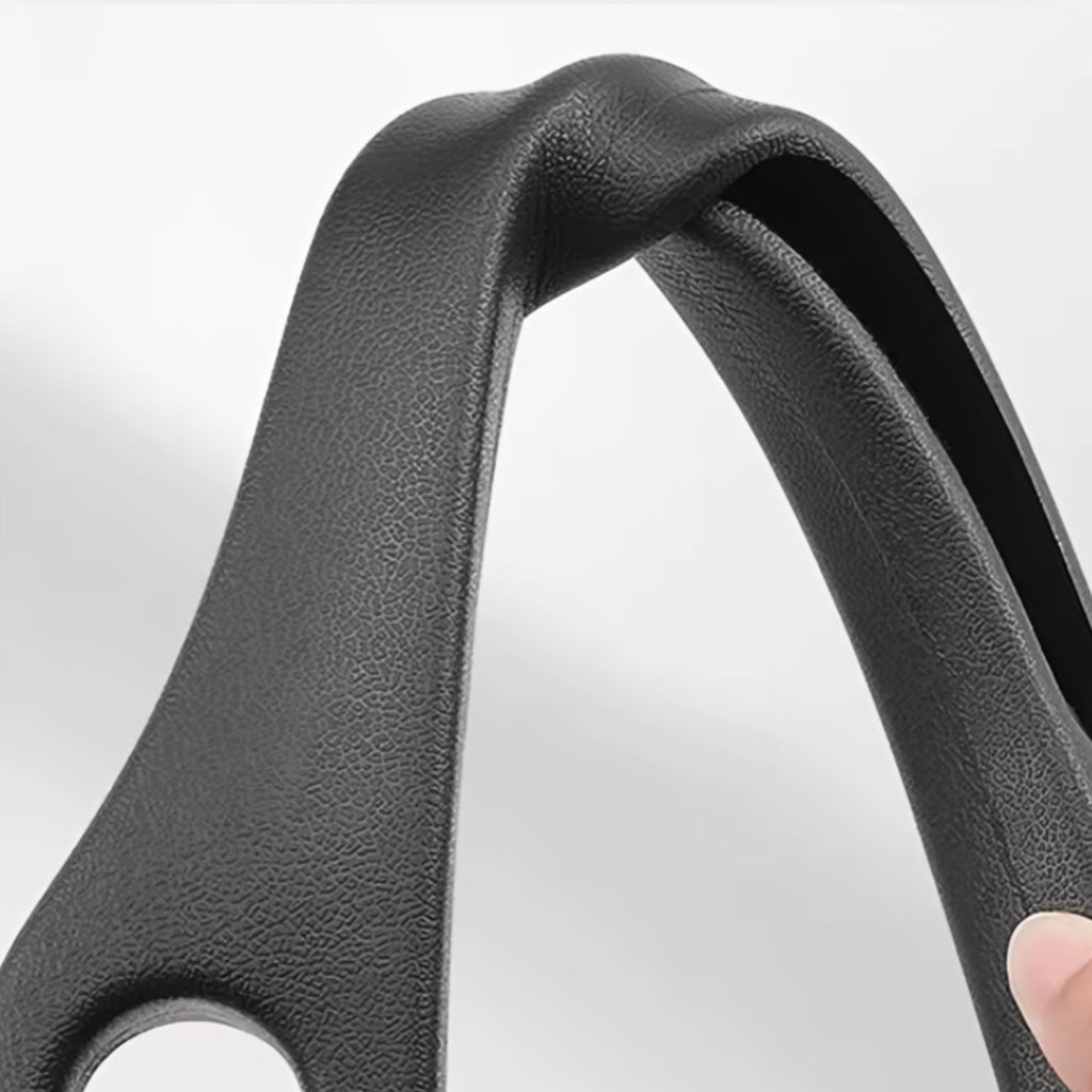 Close-up demonstrating the flexible, compressible, and textured black material of the car seat gap filler.