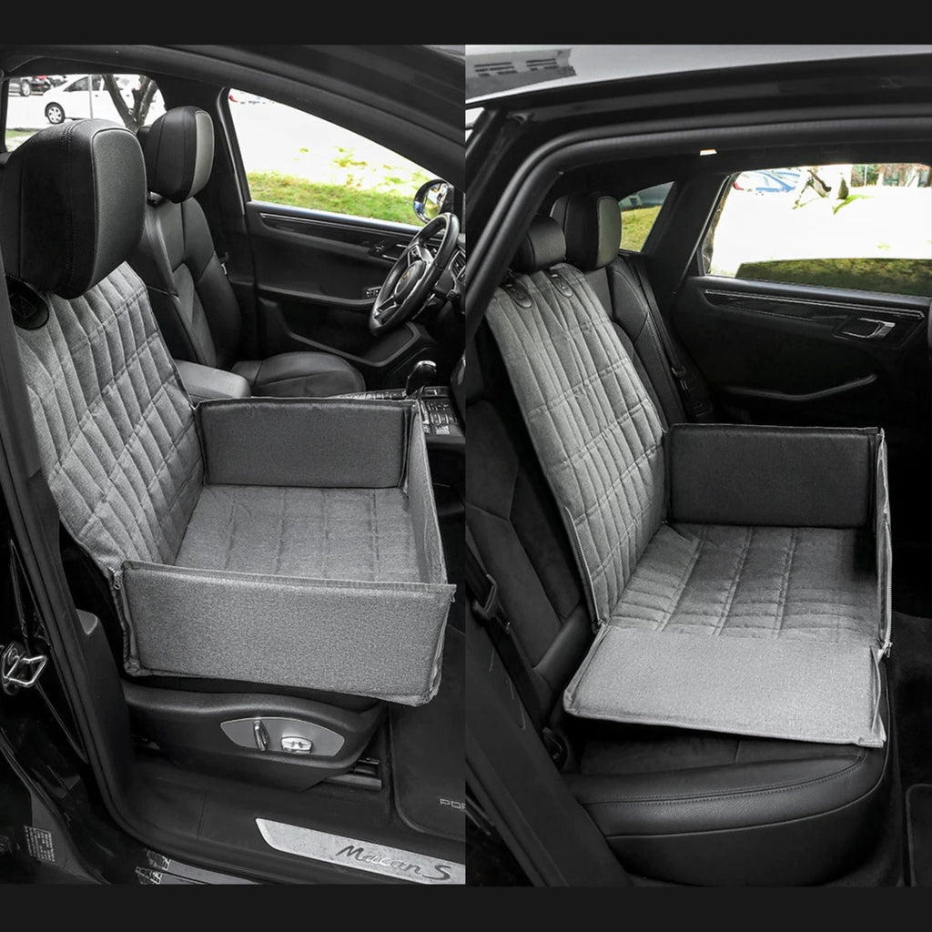 Stealth grey folding dog car seat hammock installed in a vehicle backseat, showing the side panel folded down for easy access.