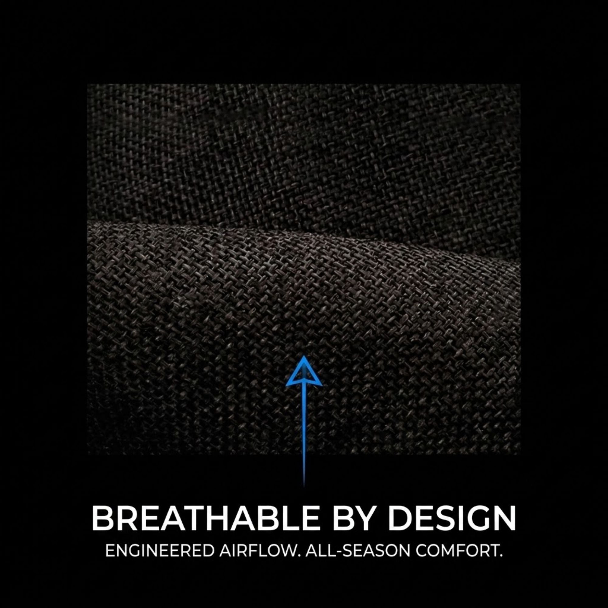 Close-up of a dark woven fabric texture with a blue upward arrow and the text 'BREATHABLE BY DESIGN' and 'ENGINEERED AIRFLOW. ALL-SEASON COMFORT.