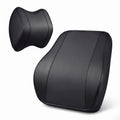 Black memory foam neck headrest and lumbar support pillow set on a white background.