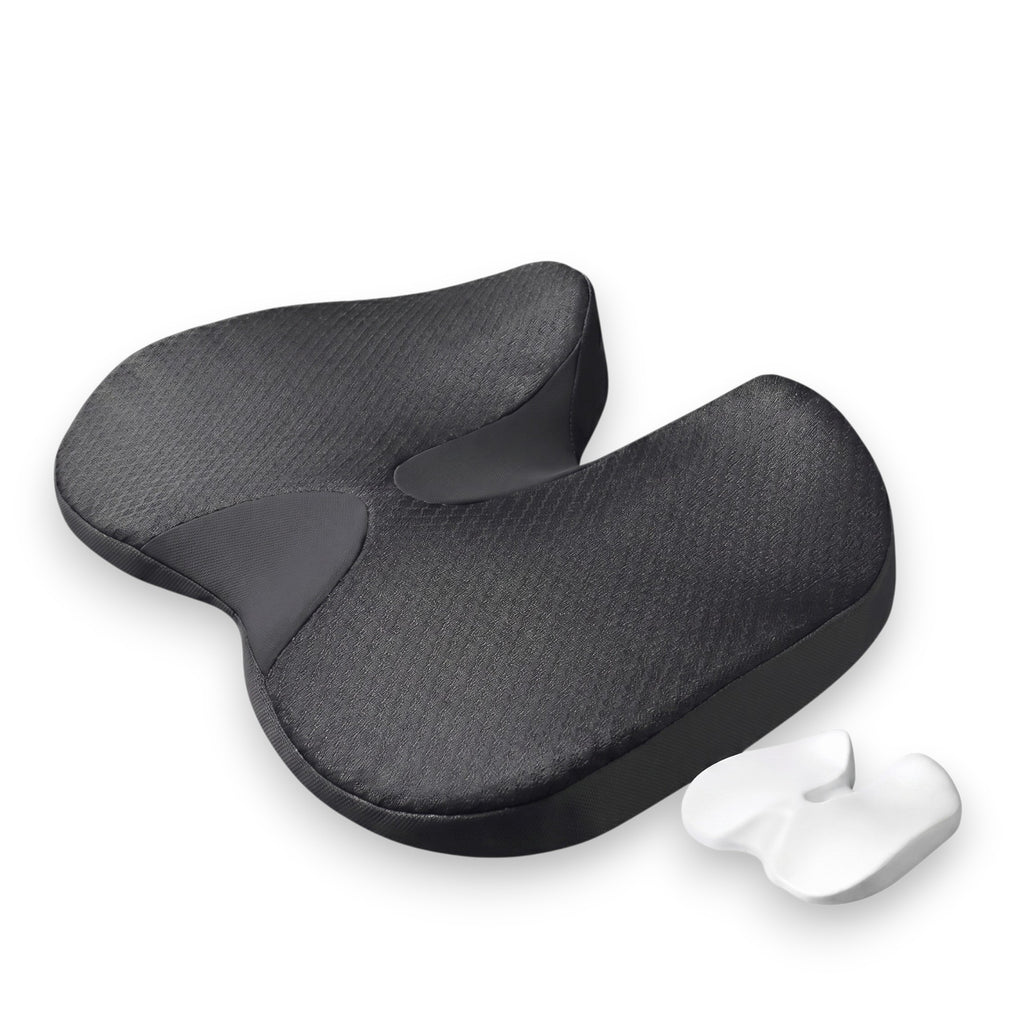 Black orthopaedic memory foam car seat driving cushion next to its white memory foam core insert on a solid white background.