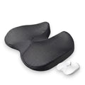 Black orthopaedic memory foam car seat driving cushion next to its white memory foam core insert on a solid white background.