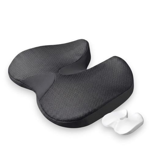 Black orthopaedic memory foam car seat driving cushion next to its white memory foam core insert on a solid white background.