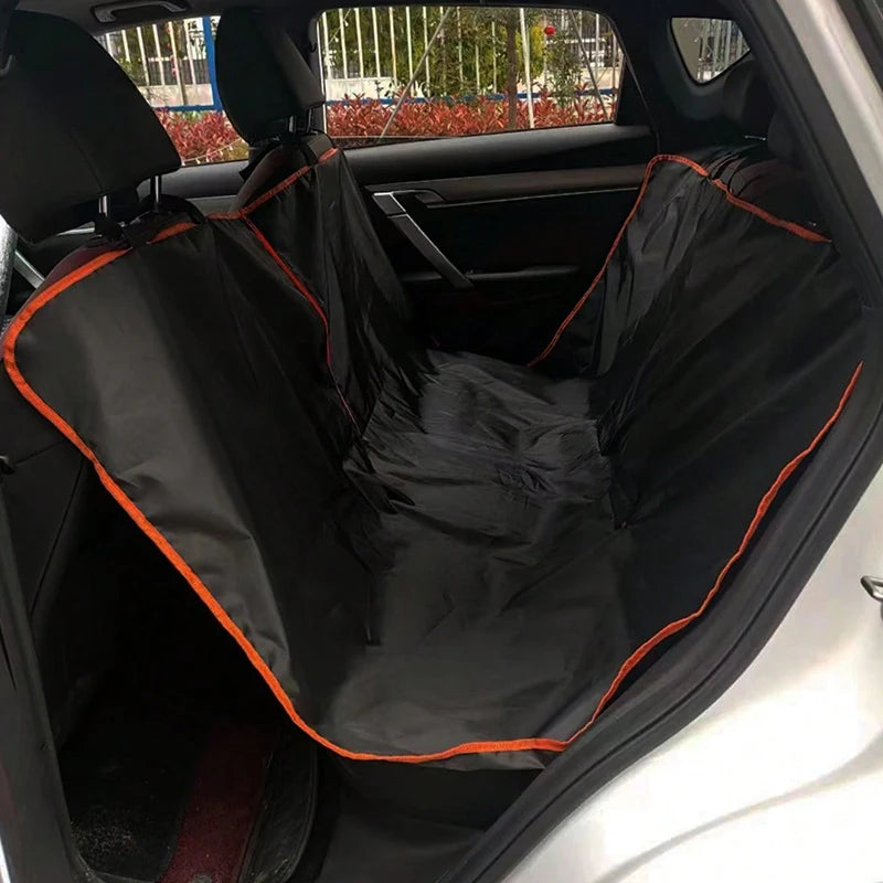 Empty black pet car seat protector installed in the rear passenger seats of a vehicle, displaying full hammock-style coverage.