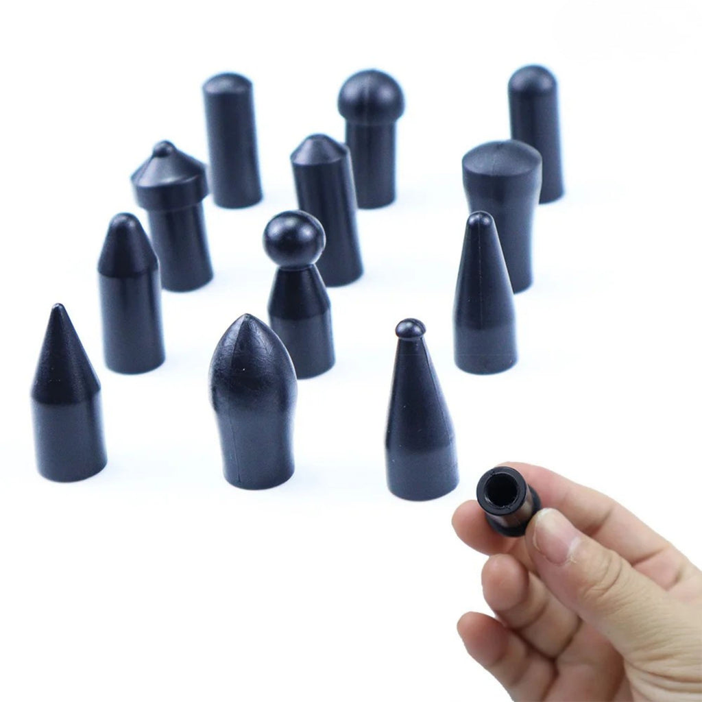 Close-up view of the assorted black contoured screw-on heads designed to match specific vehicle panel dent depths and angles.