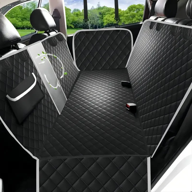 Black dog car backseat cover installed in a vehicle, highlighting the integrated mesh viewing window and built-in storage pocket.