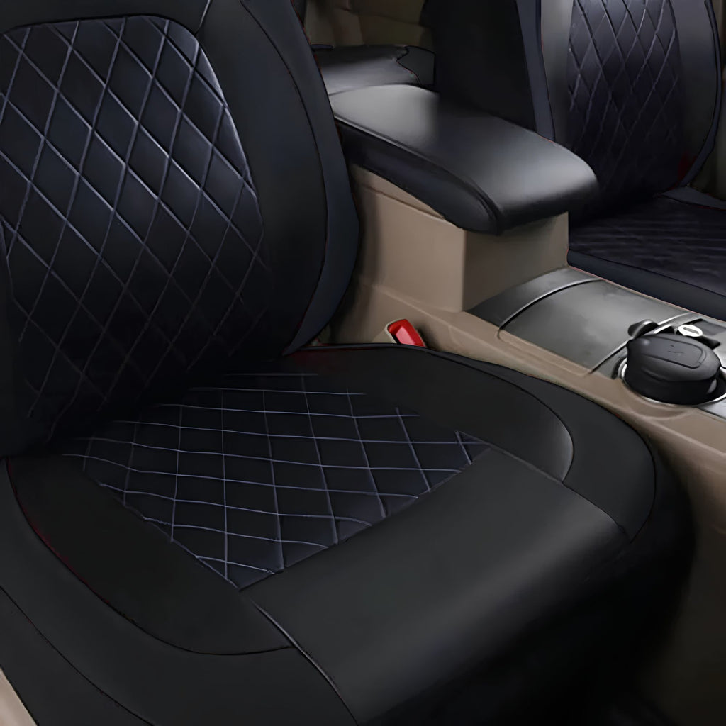 Close up detail showing the quilted stitching pattern and PU artificial leather material on the vehicle seat base.