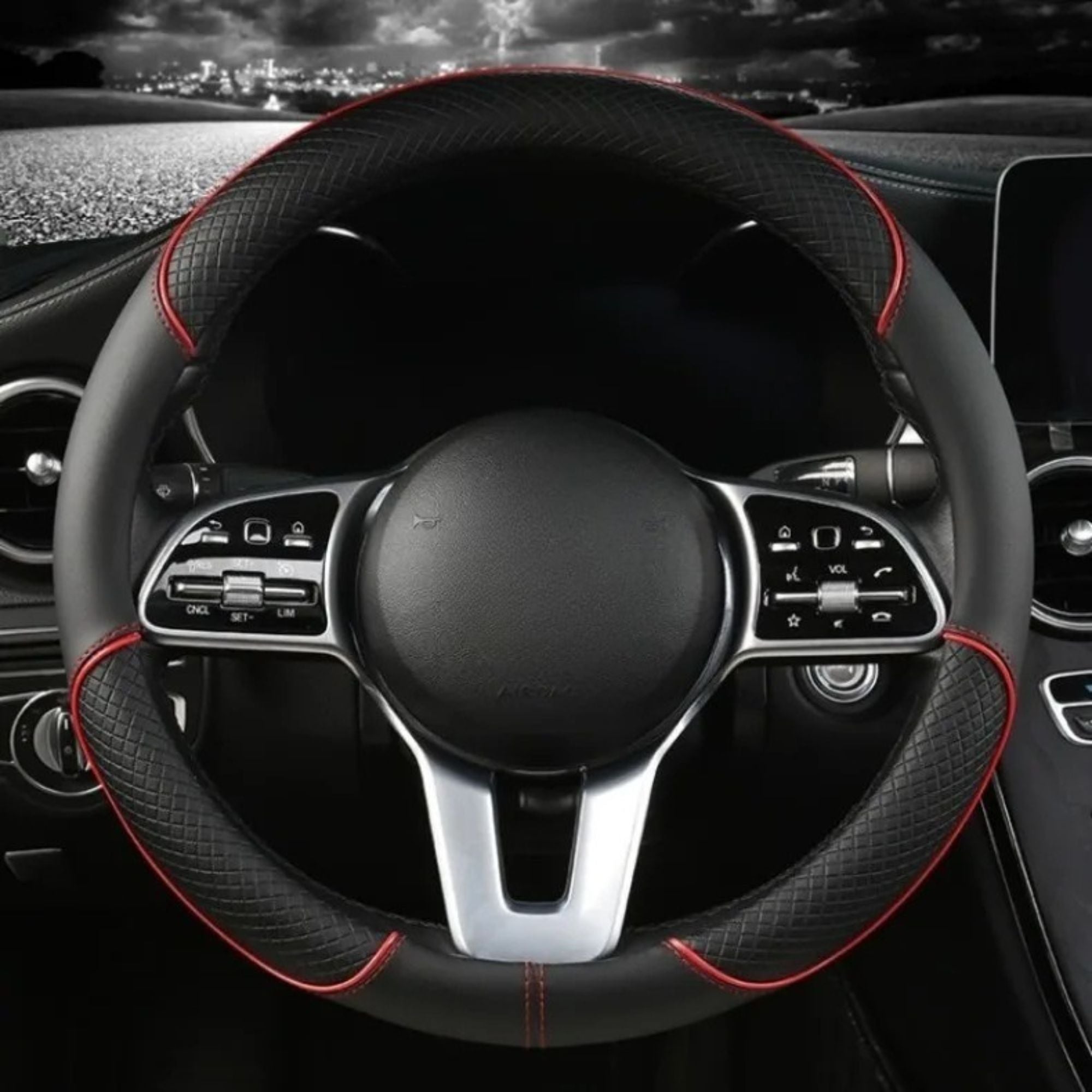 Diamond Leather Steering Wheel Cover in black leather with red stitching, installed on a steering wheel